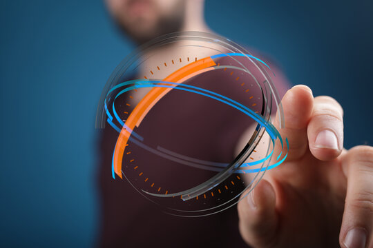 Abstract hand touching a glowing digital globe interface representing technology, innovation, and futuristic concepts on a blue backg