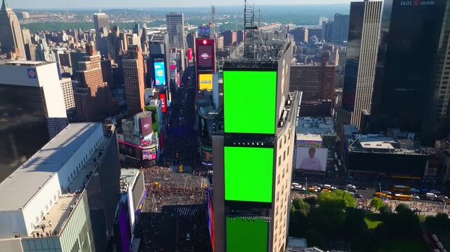 Aerial View of Times Square with Green Screens Against a Bustling City Background Capturing the Vibrance and Energy of Urban Life