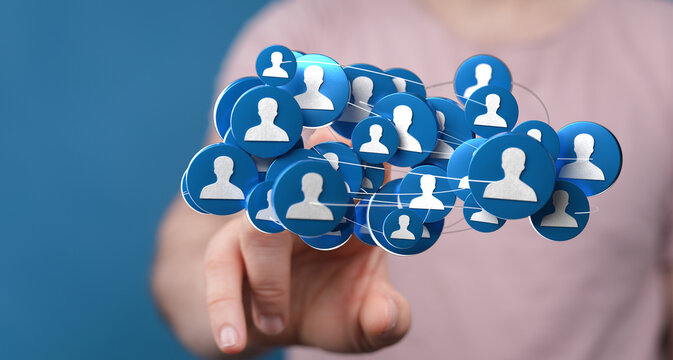 Concept of digital networking and social connections illustrated with person icons being touched by a hand. Represents community, online interac