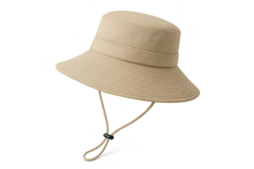 Beige bucket hat with adjustable chin strap isolated on transparent background.
