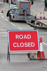 Road closed due to floods sign set up in Shrewsbury Street as flooding from the River Seven over flows on to roads in surrounding area causing congestion and traffic problems.