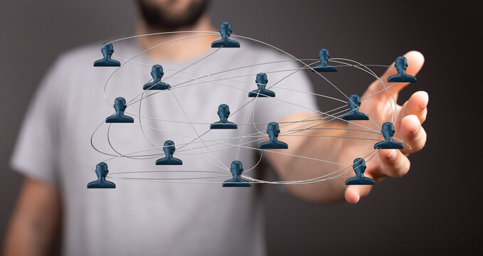 Close up shot of person showing network diagram of human connections, representing community and global concepts.