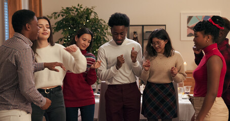 Students celebrate the end of the session. They gathered at party and dance. Guy of African...