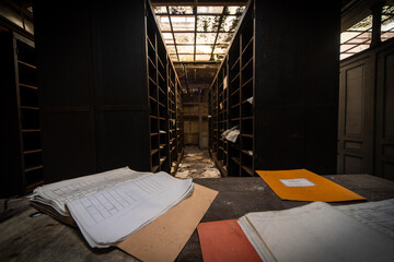 Derelict archive corridor with dusty files and broken skylight - moody abandoned office interior