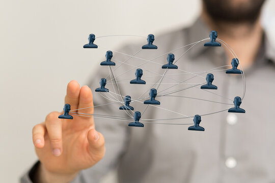 Concept of connection, community, and social networking illustrated with a digital network and finger touch. Representing global connectivity an