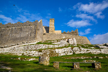 Castle the Rock of Cashel or Cashel of the Kings and St. Patrick Rock at Cashel, Ireland. Beautiful sunny weather with blue sky. 