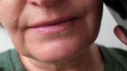Closeup of Mature woman speaking on phone: expressive conversation and communication dynamics - Powered by Adobe