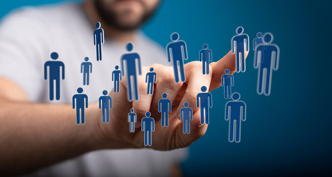 Hand reaching out to touch digital human icons representing connection, community and teamwork. Perfect for business, social media, and technolo