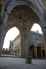 Inside the Castle the Rock of Cashel or Cashel of the Kings and St. Patrick Rock at Cashel, Ireland. Blue sunny sky. 