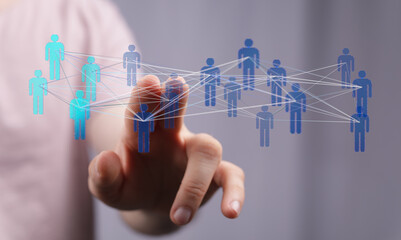 Hand touching digital connections, illustrating teamwork, network, and communication in business. Concepts of technology, and digital transforma