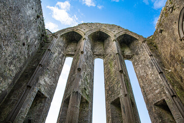 Inside the Castle the Rock of Cashel or Cashel of the Kings and St. Patrick Rock at Cashel, Ireland. Blue sunny sky. 
