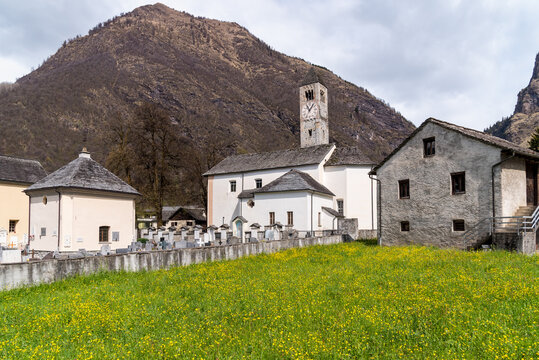 View of the parish church of San Martino located in Olivone, a hamlet of Blenio in the canton of Ticino, Switzerland.