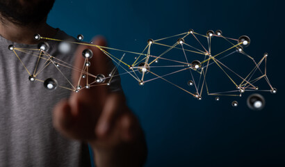 Person points at digital network with glowing dots. Representing technology, connections, globalization. Futuri