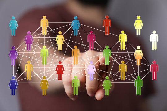 Hand touching network of diverse people icons, symbolizing community, teamwork, and connectivity. Representing