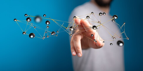 Close-up of a hand touching a network of connected nodes representing data, technology, and global connection.