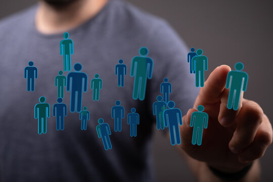 Person touching digital icons representing people, connection, network, teamwork, business and technology. Conc - Powered by Adobe