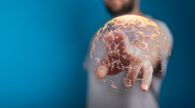 Person interacting with a glowing digital globe representing global connection, technology, and innovation against a blue background. Ideal for