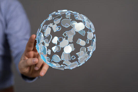 Abstract network concept, hand interacting with a sphere of social media and communication icons. Digital technology connection. - Powered by Adobe