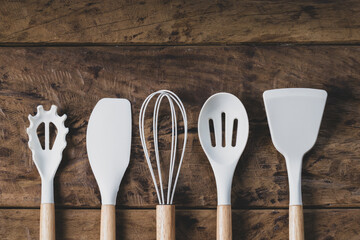 Kitchen Utensil Set Arranged Neatly on Wooden Tabletop