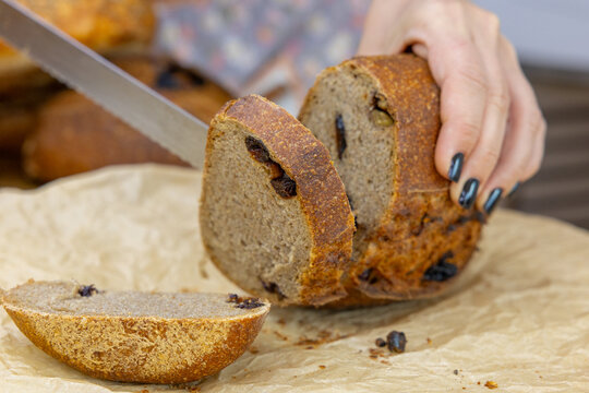 Fresh bread from the oven at a small artisan bakery at home. Very healthy sourdough bread products of various types.