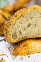 Fresh bread from the oven at a small artisan bakery at home. Very healthy sourdough bread products of various types. 