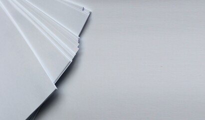 Sheets of white paper on a white background