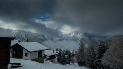 cottages in the village of rosswald during winter, switzerland
