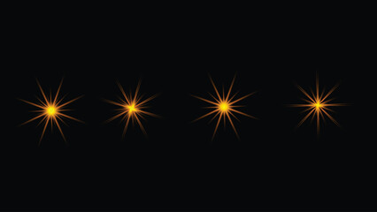 Fototapeta premium Four golden starburst light effect elements glowing brightly