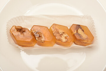 Orange marmalade with nuts. A sweet snack.