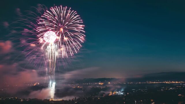 Vibrant pink and white fireworks explode over a misty city skyline at twilight creating a festive 4K Ai HD high quality video.	
