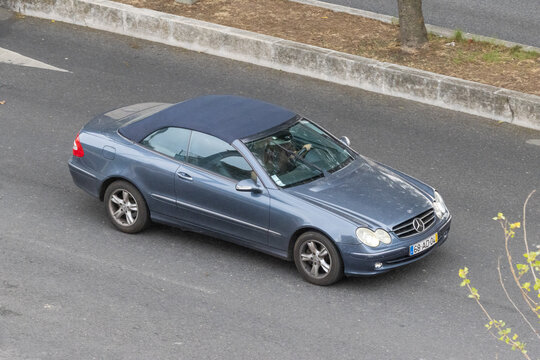 Mercedes benz clk convertible car driving on road