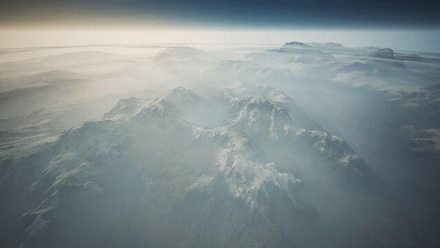 Vast mountain terrain stretches beneath a blanket of mist, illuminated by the soft morning light. The peaks rise dramatically, showcasing natures untouched beauty and tranquility.