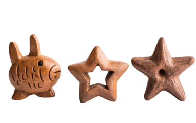 Handmade ceramic lanterns featuring fish shapes arranged for a charming nautical themed setup isolated on transparent background PNG