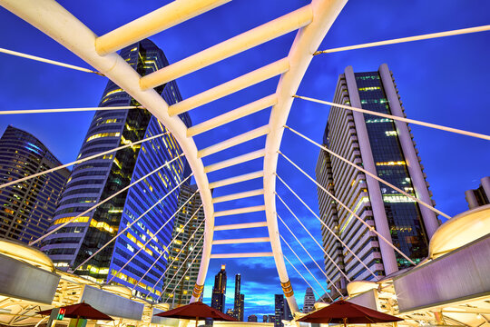 Sky walk bridge at Chong Nonsi train station at dusk, Bangkok, Thailand