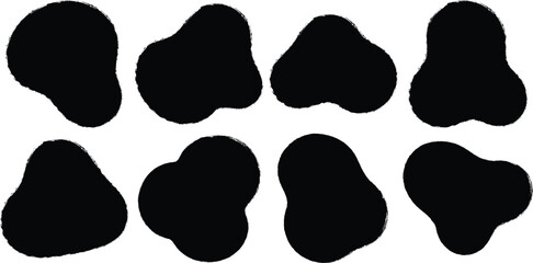 Eight abstract black organic shapes with irregular edges on a white background