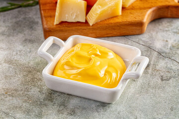 Yellow cheddar cheese creamy sauce