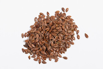 Flax seeds on a white background, top view