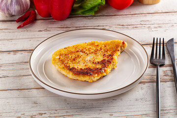 Breaded crispy chicken schnitzel