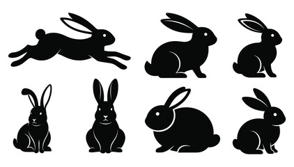 Collection of seven black rabbit silhouettes in various poses bunny white background