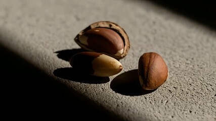 Brazil nuts close-up, highlighting healthy food, nutrition, vegan protein. Perfect for health blogs, diet plans, culinary videos, and promoting natural snacks and superfoods.