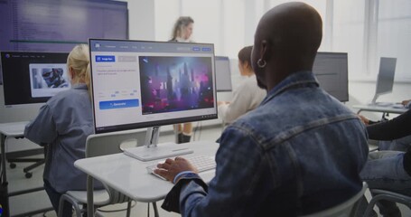 Focused Man Creating Futuristic City Image With AI Software in Modern Classroom. African American Man Using AI Software to Generate Image. Concept of Digital Transformation Through AI in Education. - Powered by Adobe