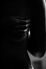 black and white female breasts close-up 