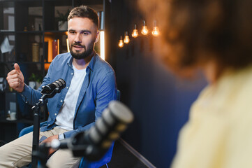 Content creators recording podcast in home studio