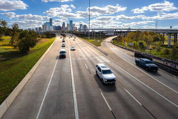 Houston Downtown urban highway with vehicle street expressway transportation with business downtown modern skyline and skyscraper metropolis and business office Houston, Texas, United States © Nantiya