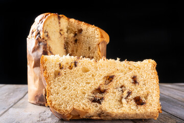 Panettone with chocolate chips, a beautiful and delicious panettone with real chocolate chips on a rustic table, Selective Focus.