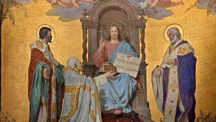 Rome, Italy - 11 January 2025. Mural from San Clemente with Christ enthroned, blessing hand raised,...