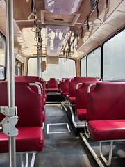Fototapeta premium Seats in an empty old bus, metro, cabin, transport