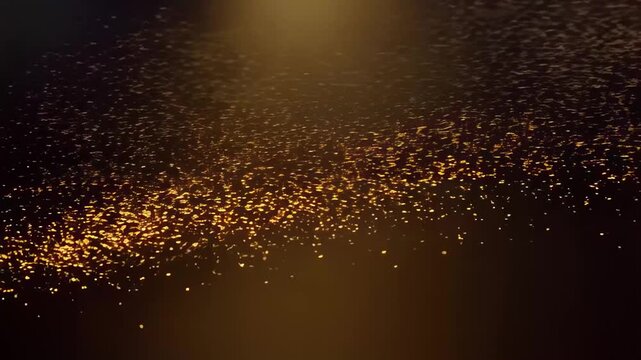 This enchanting video presents a stunning display of golden particles shimmering against a dark backdrop. The flowing motion of the particles creates a captivating visual effect, highlighting the eleg