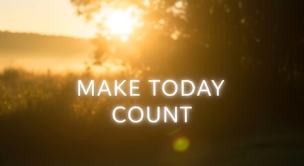 The sun rises over a field, casting a warm golden glow on the landscape, inspiring the viewer to make today count and seize the day