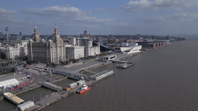 Explore Liverpool's waterfront with stunning architecture and bustling harbor